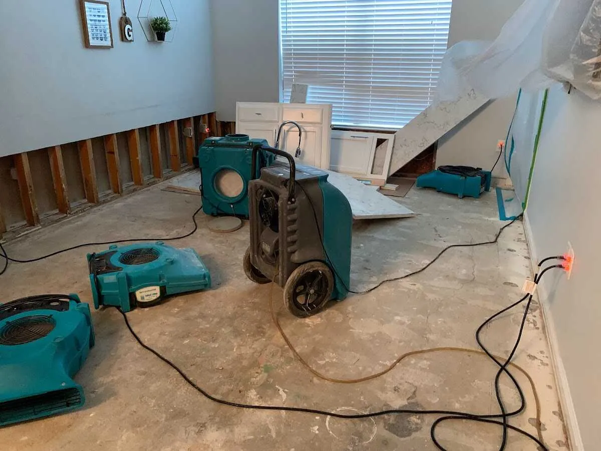 Dehumidifier in flood-cut room for Water Damage Restoration in Pontotoc
